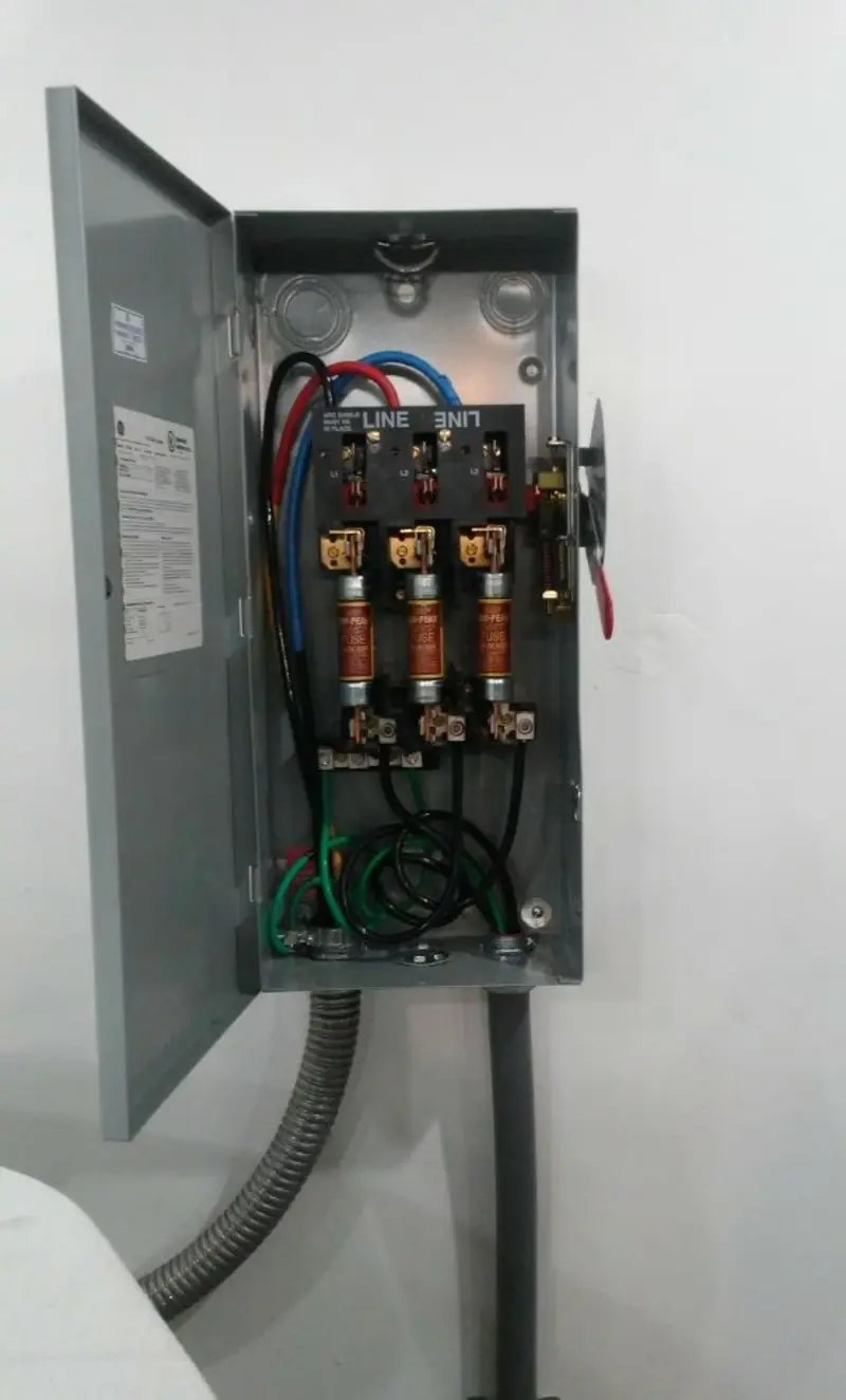 Three-phase disconnect switch installed for Smoke Detector Installation in Watergate