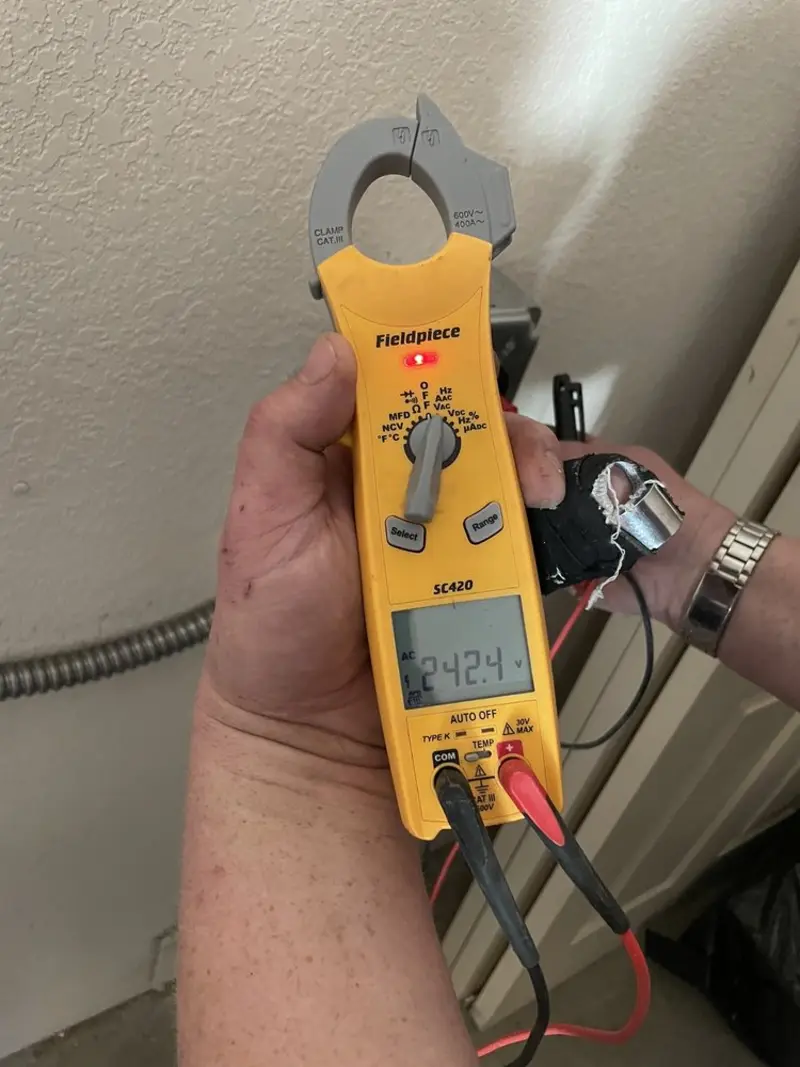Voltage testing with clamp meter during Generator Installation in Watergate